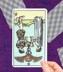 2 of cups card reversed